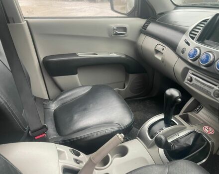 Черный Мицубиси Л 200, объемом двигателя 2.5 л и пробегом 145 тыс. км за 6800 $, фото 14 на Automoto.ua