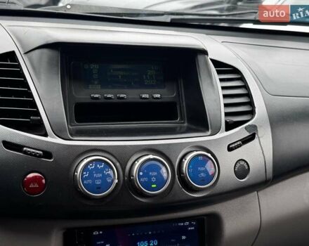 Черный Мицубиси Л 200, объемом двигателя 2.5 л и пробегом 330 тыс. км за 9890 $, фото 15 на Automoto.ua