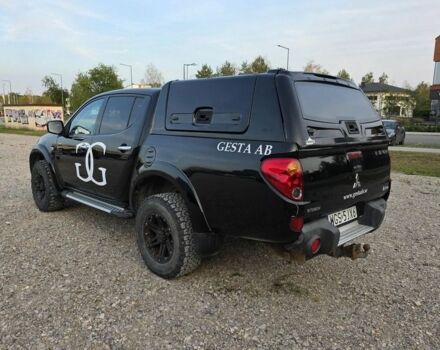 Черный Мицубиси Л 200, объемом двигателя 2.5 л и пробегом 213 тыс. км за 3006 $, фото 7 на Automoto.ua