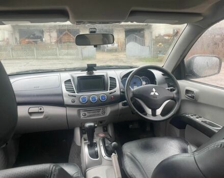 Черный Мицубиси Л 200, объемом двигателя 2.5 л и пробегом 145 тыс. км за 6800 $, фото 15 на Automoto.ua