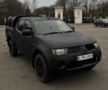 Черный Мицубиси Л 200, объемом двигателя 2.5 л и пробегом 160 тыс. км за 5300 $, фото 1 на Automoto.ua