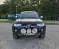 Черный Мицубиси Л 200, объемом двигателя 2.5 л и пробегом 213 тыс. км за 3006 $, фото 1 на Automoto.ua