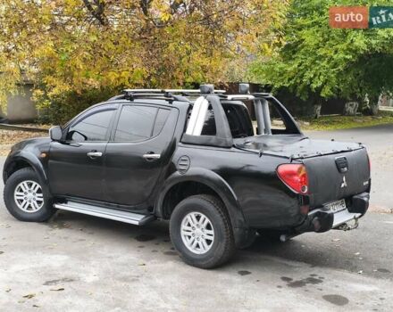 Черный Мицубиси Л 200, объемом двигателя 2.48 л и пробегом 260 тыс. км за 9500 $, фото 10 на Automoto.ua