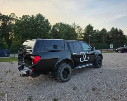 Черный Мицубиси Л 200, объемом двигателя 2.5 л и пробегом 213 тыс. км за 3006 $, фото 4 на Automoto.ua