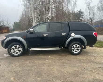 Черный Мицубиси Л 200, объемом двигателя 2.5 л и пробегом 145 тыс. км за 6800 $, фото 2 на Automoto.ua