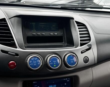 Чорний Міцубісі Л 200, об'ємом двигуна 2.5 л та пробігом 330 тис. км за 9890 $, фото 15 на Automoto.ua