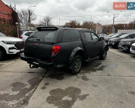 Черный Мицубиси Л 200, объемом двигателя 2.5 л и пробегом 330 тыс. км за 9890 $, фото 4 на Automoto.ua