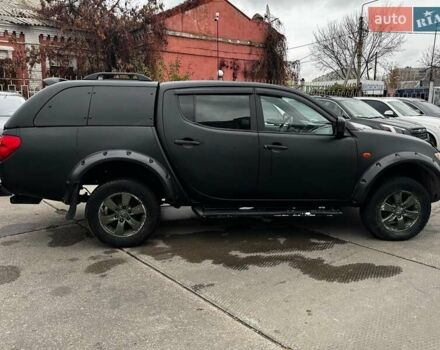 Черный Мицубиси Л 200, объемом двигателя 2.5 л и пробегом 330 тыс. км за 9890 $, фото 3 на Automoto.ua