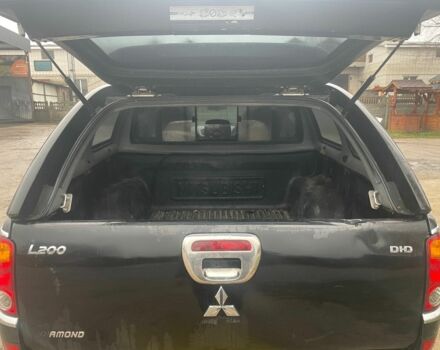 Черный Мицубиси Л 200, объемом двигателя 2.5 л и пробегом 145 тыс. км за 6800 $, фото 10 на Automoto.ua