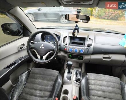 Черный Мицубиси Л 200, объемом двигателя 2.48 л и пробегом 260 тыс. км за 9500 $, фото 21 на Automoto.ua