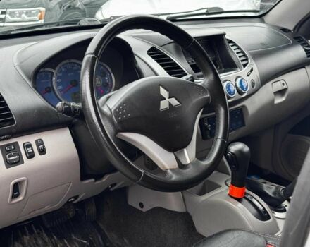 Чорний Міцубісі Л 200, об'ємом двигуна 2.5 л та пробігом 330 тис. км за 9890 $, фото 11 на Automoto.ua