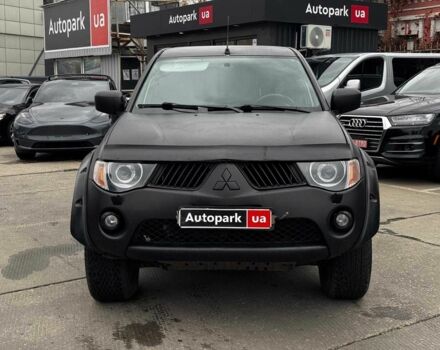 Чорний Міцубісі Л 200, об'ємом двигуна 2.5 л та пробігом 330 тис. км за 9890 $, фото 1 на Automoto.ua