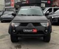 Чорний Міцубісі Л 200, об'ємом двигуна 2.5 л та пробігом 330 тис. км за 9890 $, фото 1 на Automoto.ua