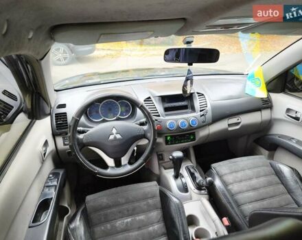 Черный Мицубиси Л 200, объемом двигателя 2.48 л и пробегом 260 тыс. км за 9500 $, фото 23 на Automoto.ua