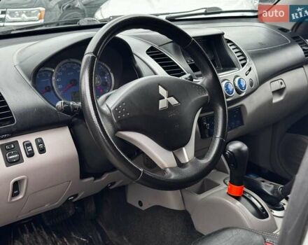 Черный Мицубиси Л 200, объемом двигателя 2.5 л и пробегом 330 тыс. км за 9890 $, фото 11 на Automoto.ua