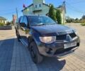 Черный Мицубиси Л 200, объемом двигателя 2.5 л и пробегом 140 тыс. км за 7298 $, фото 3 на Automoto.ua