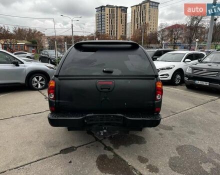 Черный Мицубиси Л 200, объемом двигателя 2.5 л и пробегом 330 тыс. км за 9890 $, фото 5 на Automoto.ua