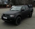 Черный Мицубиси Л 200, объемом двигателя 2.5 л и пробегом 160 тыс. км за 5300 $, фото 1 на Automoto.ua