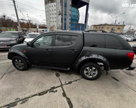 Чорний Міцубісі Л 200, об'ємом двигуна 2.5 л та пробігом 330 тис. км за 9890 $, фото 2 на Automoto.ua