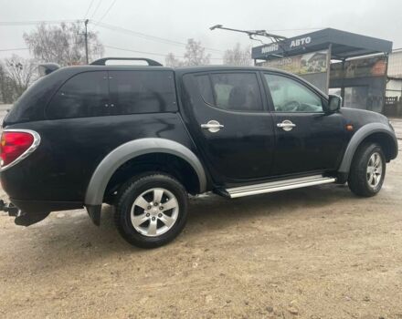 Черный Мицубиси Л 200, объемом двигателя 2.5 л и пробегом 145 тыс. км за 6800 $, фото 3 на Automoto.ua