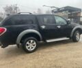 Черный Мицубиси Л 200, объемом двигателя 2.5 л и пробегом 145 тыс. км за 6800 $, фото 3 на Automoto.ua