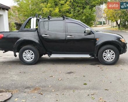 Черный Мицубиси Л 200, объемом двигателя 2.48 л и пробегом 260 тыс. км за 9500 $, фото 15 на Automoto.ua