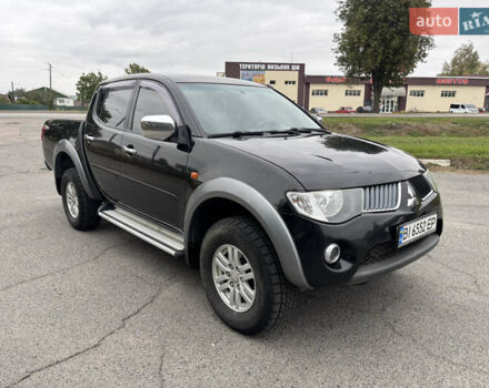 Чорний Міцубісі Л 200, об'ємом двигуна 2.5 л та пробігом 208 тис. км за 12800 $, фото 1 на Automoto.ua