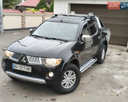 Черный Мицубиси Л 200, объемом двигателя 2.48 л и пробегом 260 тыс. км за 9500 $, фото 3 на Automoto.ua