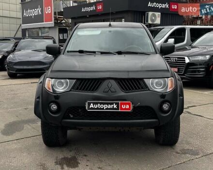 Черный Мицубиси Л 200, объемом двигателя 2.5 л и пробегом 330 тыс. км за 9890 $, фото 1 на Automoto.ua