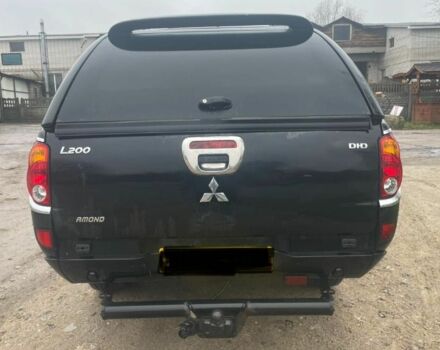 Черный Мицубиси Л 200, объемом двигателя 2.5 л и пробегом 145 тыс. км за 6800 $, фото 8 на Automoto.ua