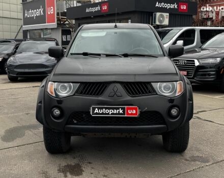 Чорний Міцубісі Л 200, об'ємом двигуна 2.5 л та пробігом 330 тис. км за 9890 $, фото 1 на Automoto.ua