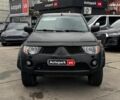 Чорний Міцубісі Л 200, об'ємом двигуна 2.5 л та пробігом 330 тис. км за 9890 $, фото 1 на Automoto.ua