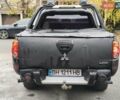 Черный Мицубиси Л 200, объемом двигателя 2.48 л и пробегом 260 тыс. км за 9500 $, фото 5 на Automoto.ua