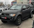 Чорний Міцубісі Л 200, об'ємом двигуна 2.5 л та пробігом 330 тис. км за 9890 $, фото 1 на Automoto.ua