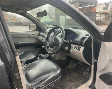 Черный Мицубиси Л 200, объемом двигателя 2.5 л и пробегом 145 тыс. км за 6800 $, фото 11 на Automoto.ua