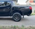 Черный Мицубиси Л 200, объемом двигателя 2.48 л и пробегом 204 тыс. км за 12800 $, фото 10 на Automoto.ua