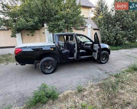 Черный Мицубиси Л 200, объемом двигателя 2.48 л и пробегом 204 тыс. км за 12800 $, фото 33 на Automoto.ua