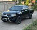 Черный Мицубиси Л 200, объемом двигателя 2.48 л и пробегом 204 тыс. км за 12800 $, фото 5 на Automoto.ua
