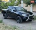 Черный Мицубиси Л 200, объемом двигателя 2.48 л и пробегом 204 тыс. км за 12800 $, фото 6 на Automoto.ua