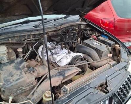 Чорний Міцубісі Л 200, об'ємом двигуна 2.5 л та пробігом 270 тис. км за 4500 $, фото 1 на Automoto.ua