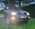 Черный Мицубиси Л 200, объемом двигателя 2.5 л и пробегом 256 тыс. км за 4800 $, фото 1 на Automoto.ua