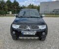 Черный Мицубиси Л 200, объемом двигателя 2.5 л и пробегом 280 тыс. км за 3200 $, фото 1 на Automoto.ua