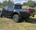 Черный Мицубиси Л 200, объемом двигателя 2.5 л и пробегом 152 тыс. км за 8101 $, фото 3 на Automoto.ua