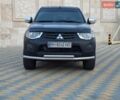 Чорний Міцубісі Л 200, об'ємом двигуна 2.48 л та пробігом 240 тис. км за 17200 $, фото 1 на Automoto.ua