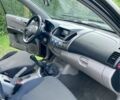 Черный Мицубиси Л 200, объемом двигателя 2.5 л и пробегом 256 тыс. км за 4800 $, фото 6 на Automoto.ua