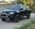 Черный Мицубиси Л 200, объемом двигателя 2.48 л и пробегом 204 тыс. км за 12800 $, фото 7 на Automoto.ua