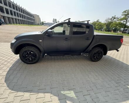 Черный Мицубиси Л 200, объемом двигателя 2.5 л и пробегом 93 тыс. км за 6600 $, фото 1 на Automoto.ua