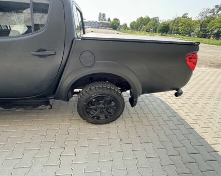 Черный Мицубиси Л 200, объемом двигателя 2.5 л и пробегом 93 тыс. км за 6600 $, фото 5 на Automoto.ua