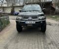 Черный Мицубиси Л 200, объемом двигателя 2.5 л и пробегом 290 тыс. км за 19200 $, фото 1 на Automoto.ua