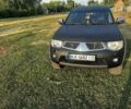 Чорний Міцубісі Л 200, об'ємом двигуна 2.5 л та пробігом 270 тис. км за 16500 $, фото 6 на Automoto.ua